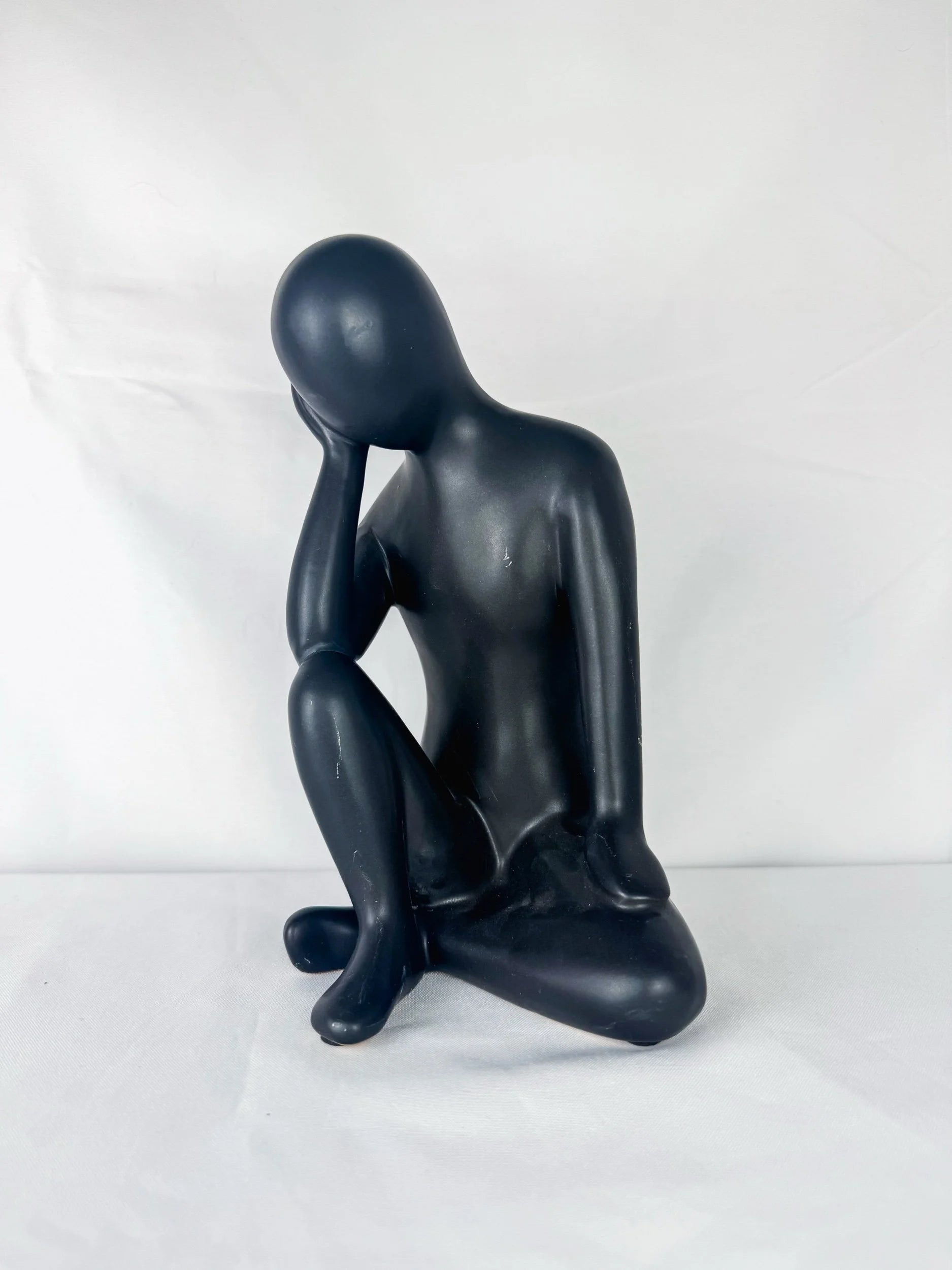 Seated Ceramic Figurine