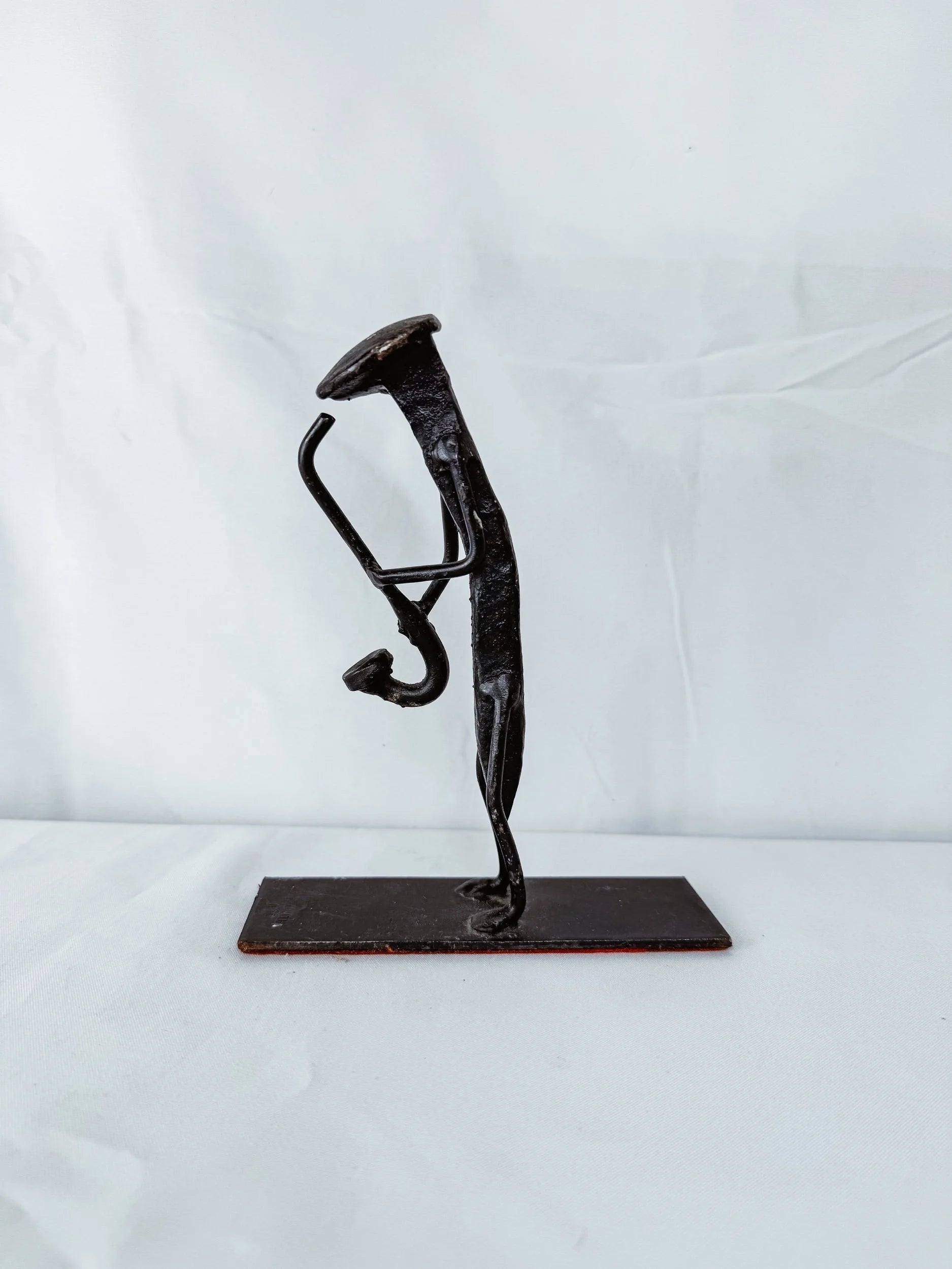 Brutalist Iron Saxophonist Sculpture