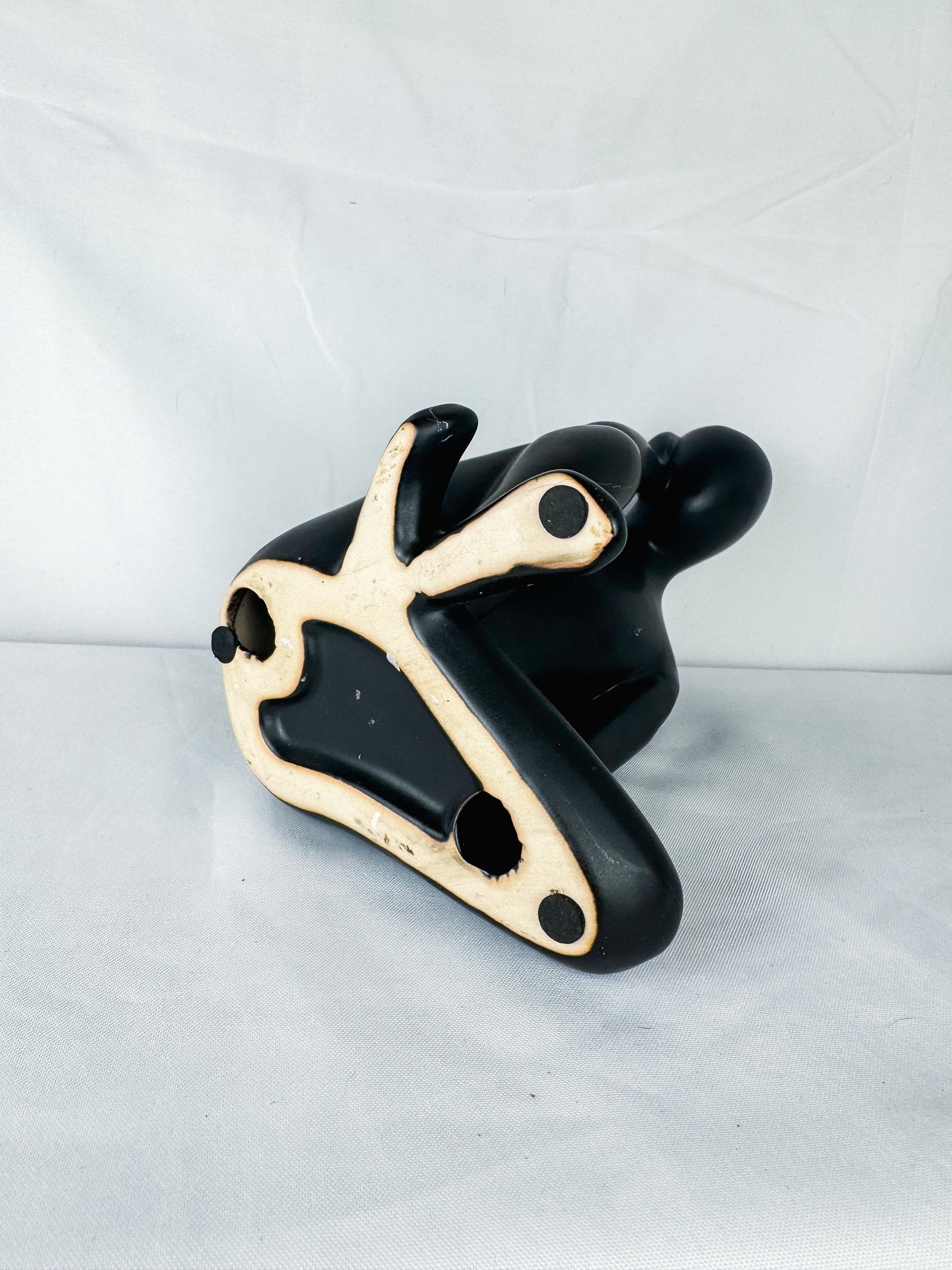 Seated Ceramic Figurine