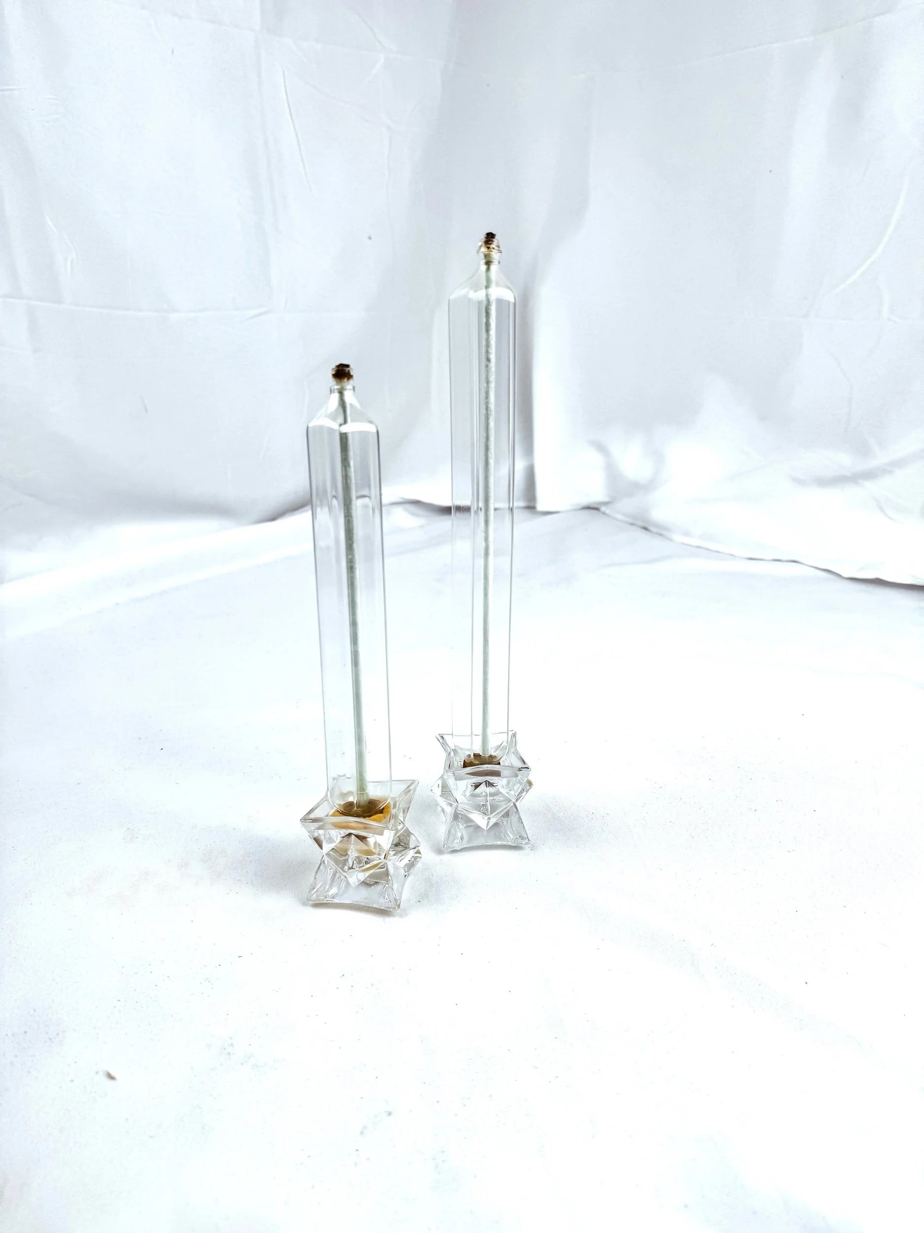 Set of Two Firelight Glass Star Taper Oil Candles