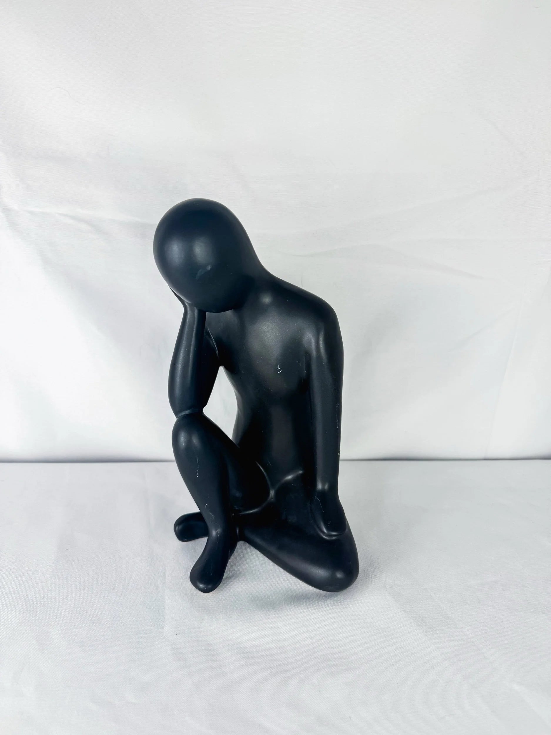 Seated Ceramic Figurine
