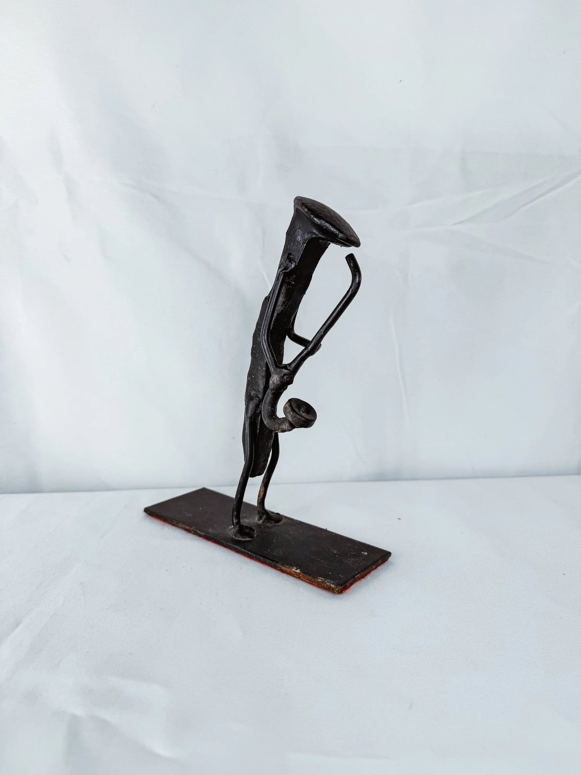 Brutalist Iron Saxophonist Sculpture