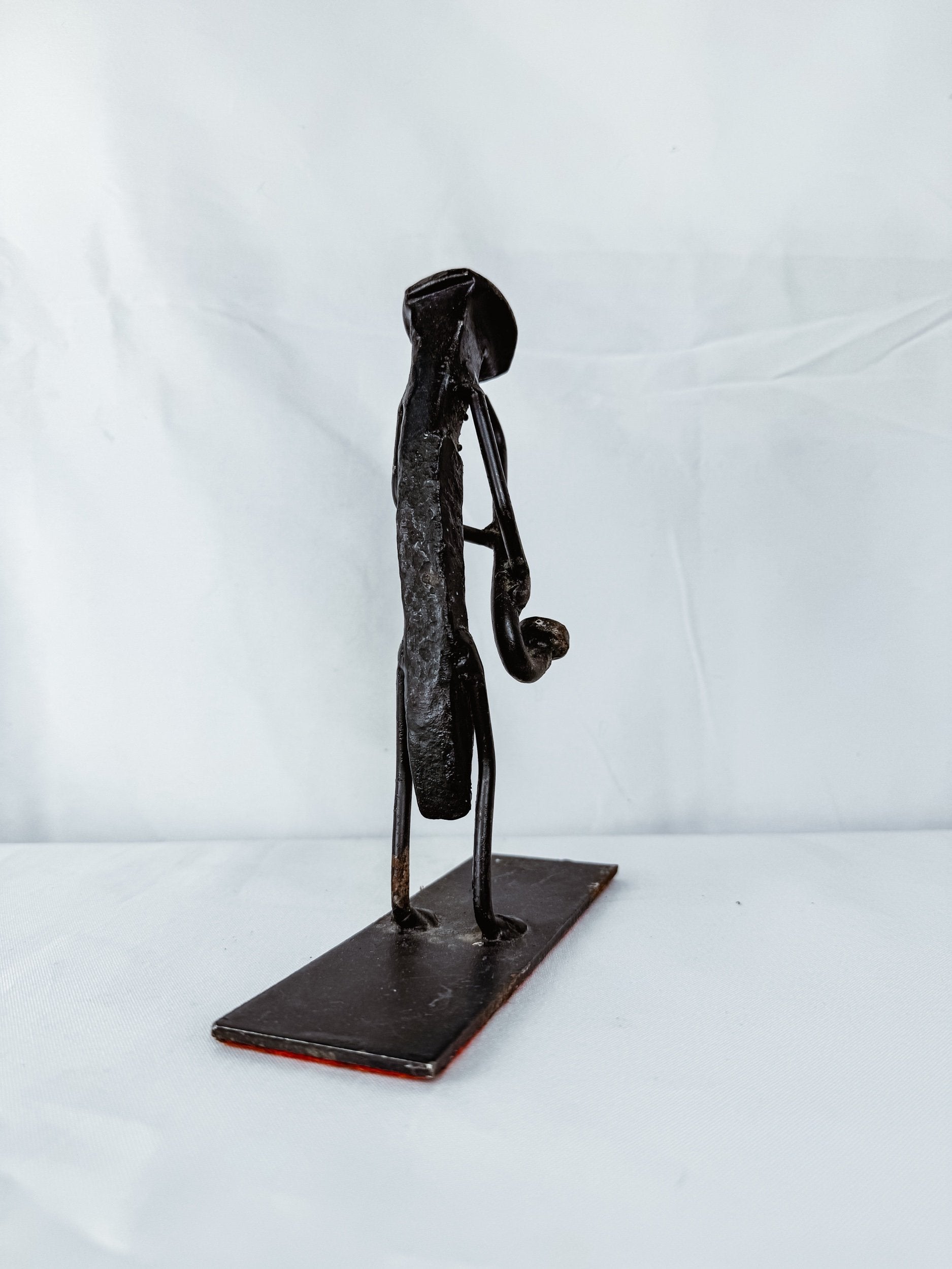 Brutalist Iron Saxophonist Sculpture